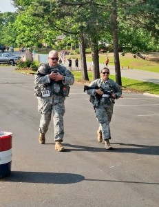 Command Sgt. Maj. Greene and Spc. Ibarra finish the Ranger Buddy Course.